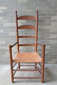 Ladder back arm chair with mushroom finials on arms, early 19th century in natural finish. Replaced