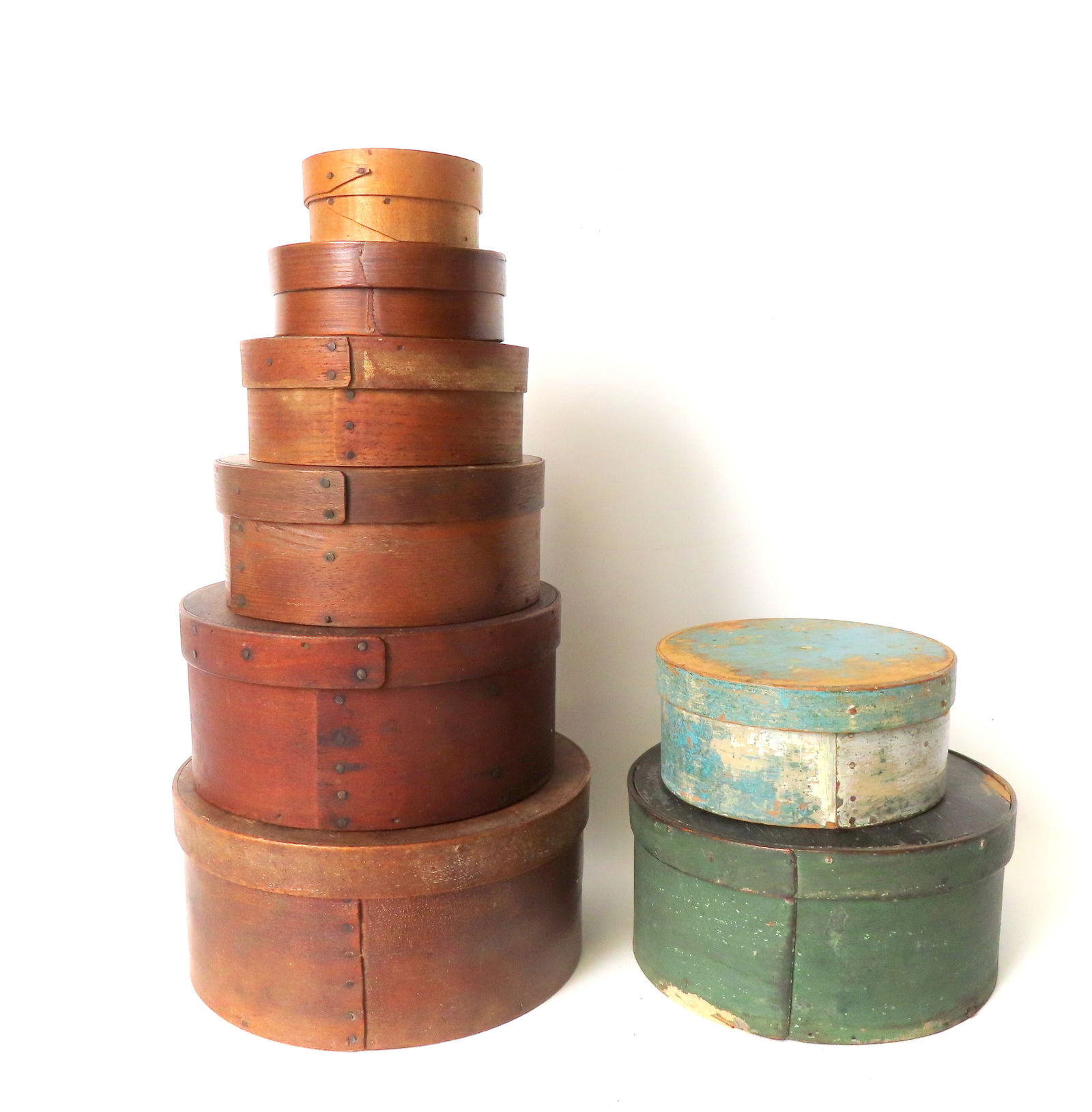 Eight early pantry boxes including 2 in original paint, together with an assembled set of 6 nested: Eight early pantry boxes including 2 in original paint, together with an assembled set of 6 nested pantry boxes in natural finish. The larger of the 2 painted boxes is in original green paint - small