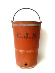 An uncommon large size wooden bucket in original salmon paint on the exterior and interior, staved