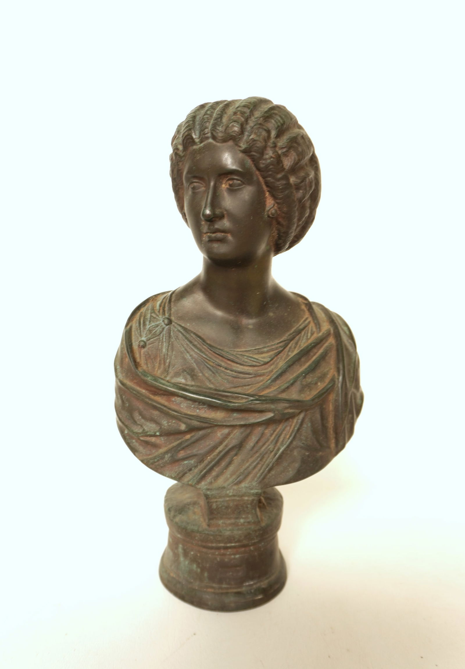 A bronze bust of a classical lady with a French foundry mark on backside - very good condition.: A bronze bust of a classical lady with a French foundry mark on backside - very good condition. Measures 8"W x 5 1/2"D x 13 1/2". Provenance: From the Marni Bakst and William Sadler collection of anti
