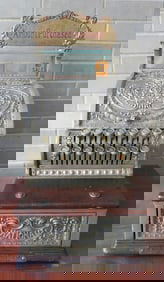A "National" nickel plated cash register, Model 313, signed "The National Cash Register Co. Dayton