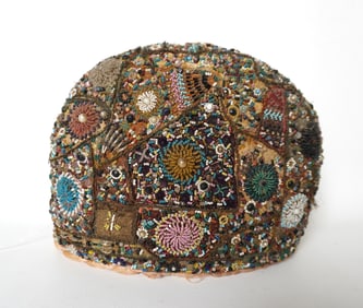 A 19th century beadwork tea cozy (keep teapot warm), good condition. Measures 13 1/2"W x 10 1/2"H.