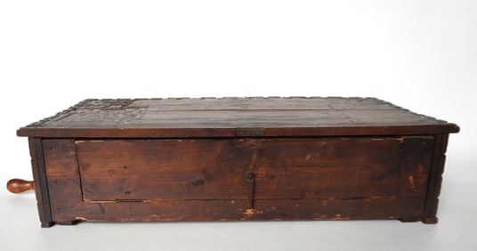 A Samuel Troll carved wooden 19th century Swiss music box, base only containing the works with