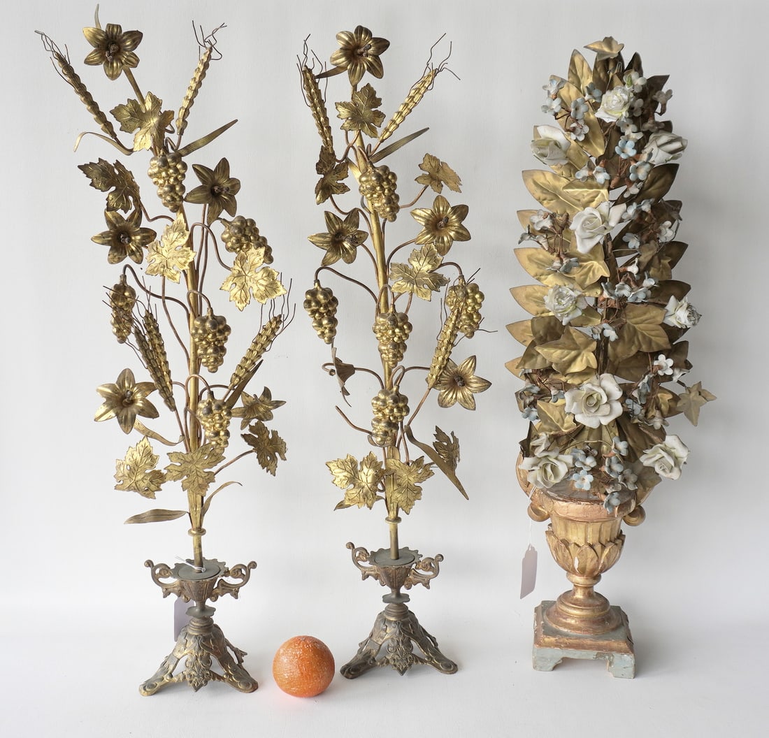 Grouping of 3 decorative 19th century garnitures including a matching pair in gilded metal mounted: Grouping of 3 decorative 19th century garnitures including a matching pair in gilded metal mounted on brass urn shaped bases - decorated with leaves, sheaf of wheat, and grapes; and a single hand made
