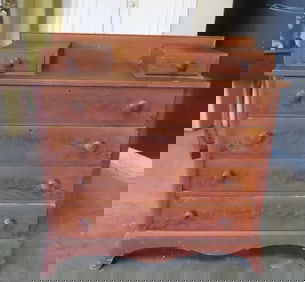 A grain painted country chest have 2 glove drawers over 4 graduated drawers on cutout base - some