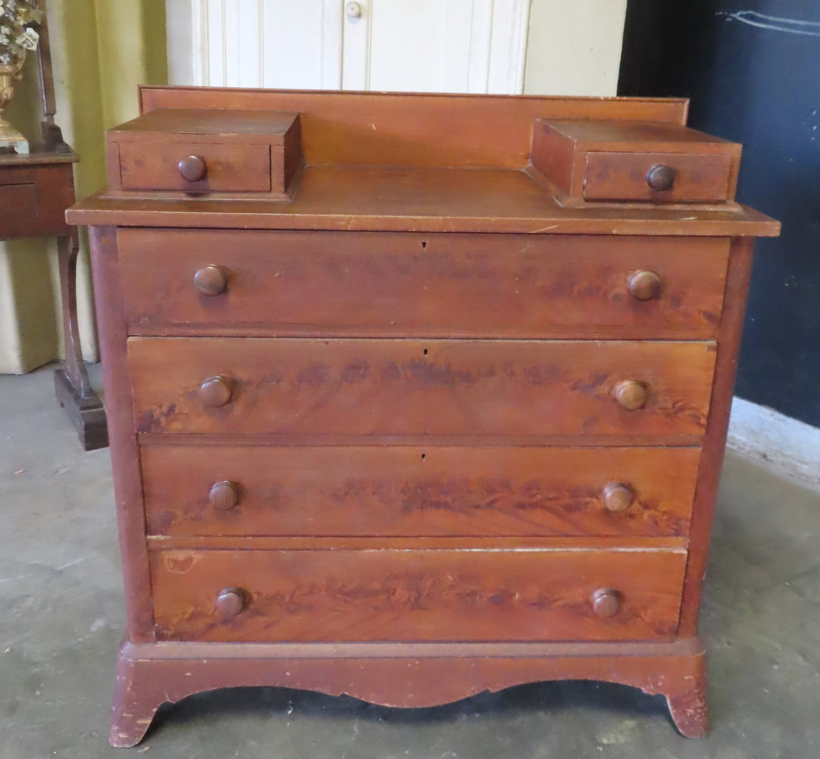 A grain painted country chest have 2 glove drawers over 4 graduated drawers on cutout base - some: A grain painted country chest have 2 glove drawers over 4 graduated drawers on cutout base - it appears that the grain paint was covered with varnish many years ago and has darkened slightly, so need 