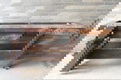 A large 19th century carpenter's maple work bench with 2 vises and lower drawer, dovetailed