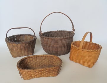 Grouping of 5 good country baskets including: Taghkanic swing handle with crisscrossed rim and