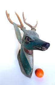A folk art hand carved buck deer head mount in original paint with real deer antlers attached to