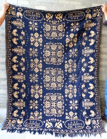 An important David Daniel Haring blue and white Jacquard coverlet, signed in corners by weaver
