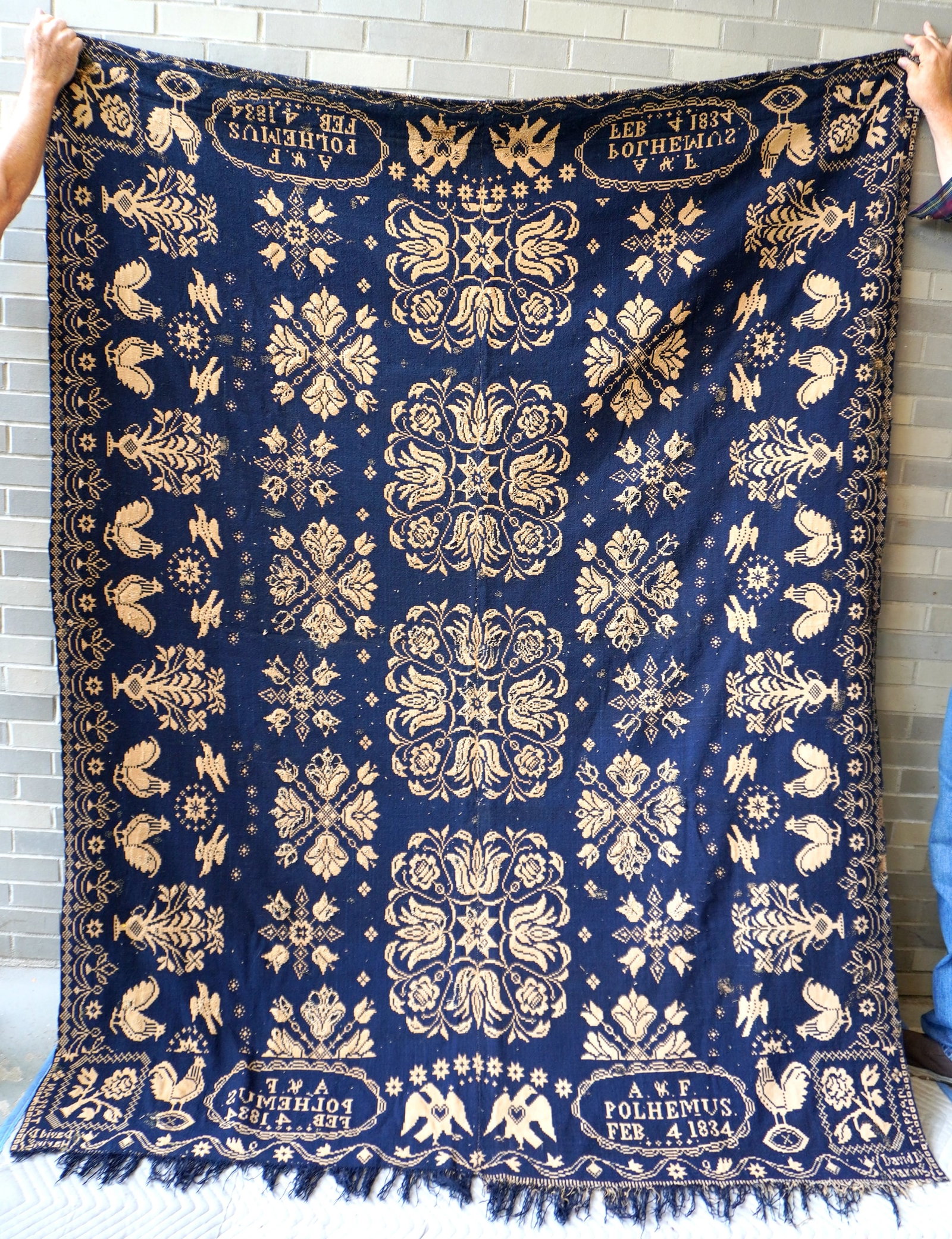 An important David Daniel Haring blue and white Jacquard coverlet, signed in corners by weaver: An important David Daniel Haring blue and white Jacquard coverlet, signed in corners by weaver "David D. Haring - Tappan" (NJ & NY 1800-1889) below his trademark of a rose with four leaves and stem. T