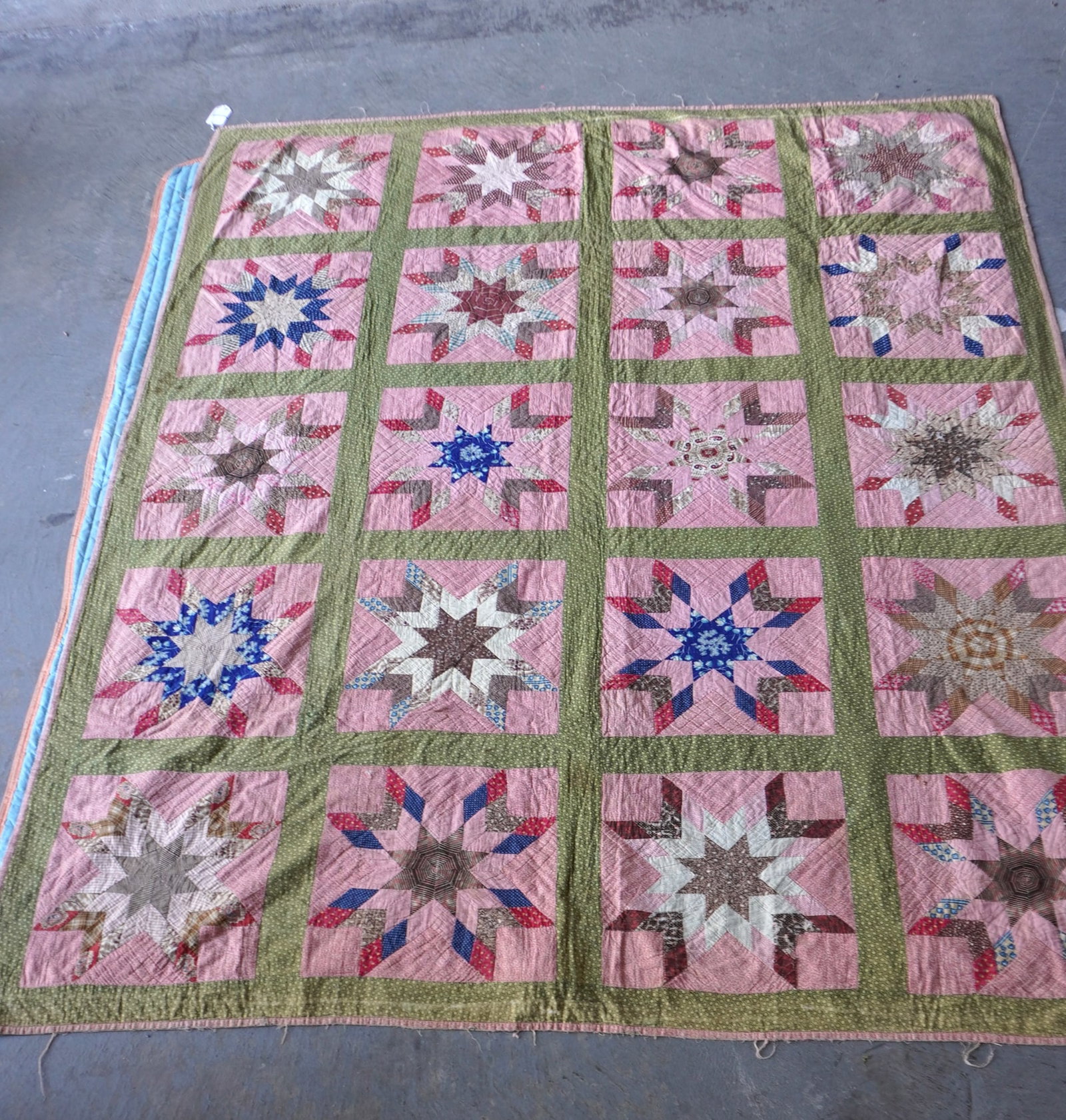 Patchwork quilt, stars within a star pattern, all hand sewn, 19th century.: Patchwork quilt, stars within a star pattern, all hand sewn, 19th century. Some use wear around the border, one block with some minor fraying, light brown stain on reverse, but overall good condition.