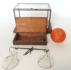 A gold scale in original box with cotterpin hinged lid - the scale in brass with glass balances,