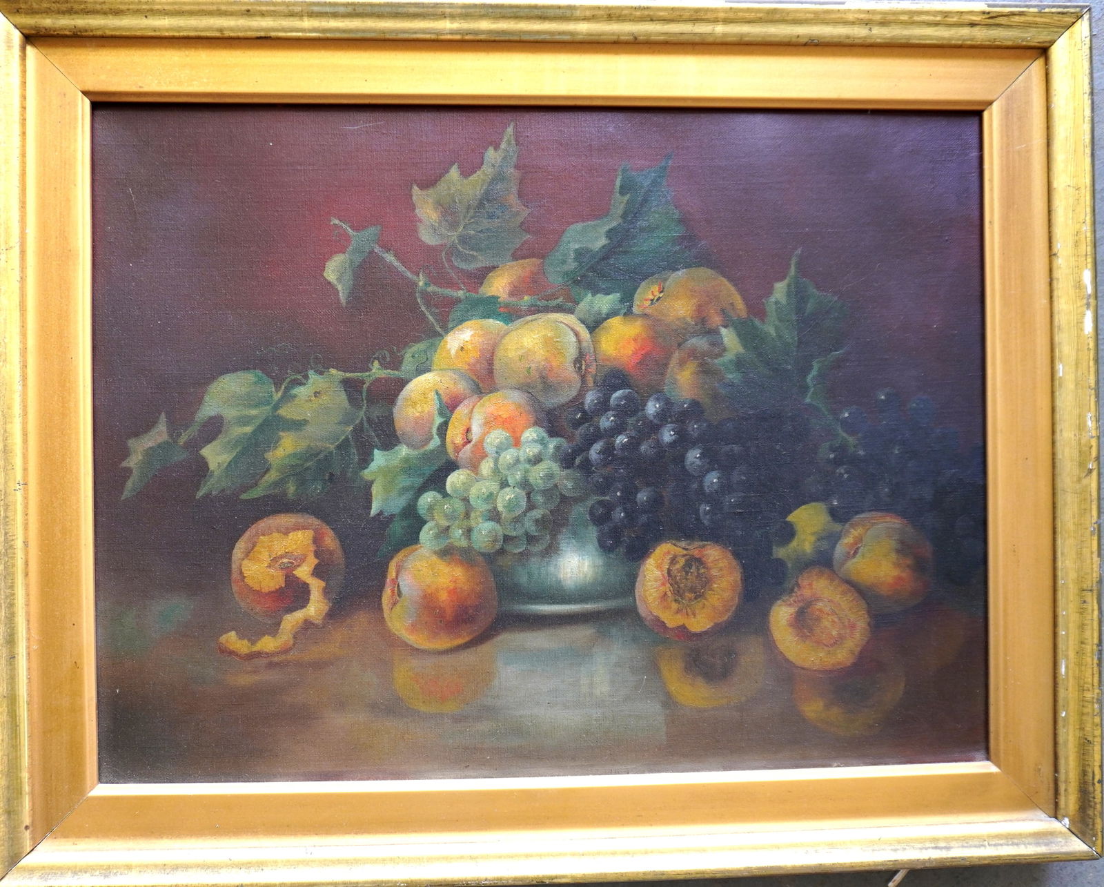 O/C Large still life of fruit on a table, late 19th century, housed in a lemon gold frame of same: O/C Large still life of fruit on a table, late 19th century, housed in a lemon gold frame of same period. Stretcher size 18" x 24" and total frame size 22 1/2" x 28 1/2". Very good condition.