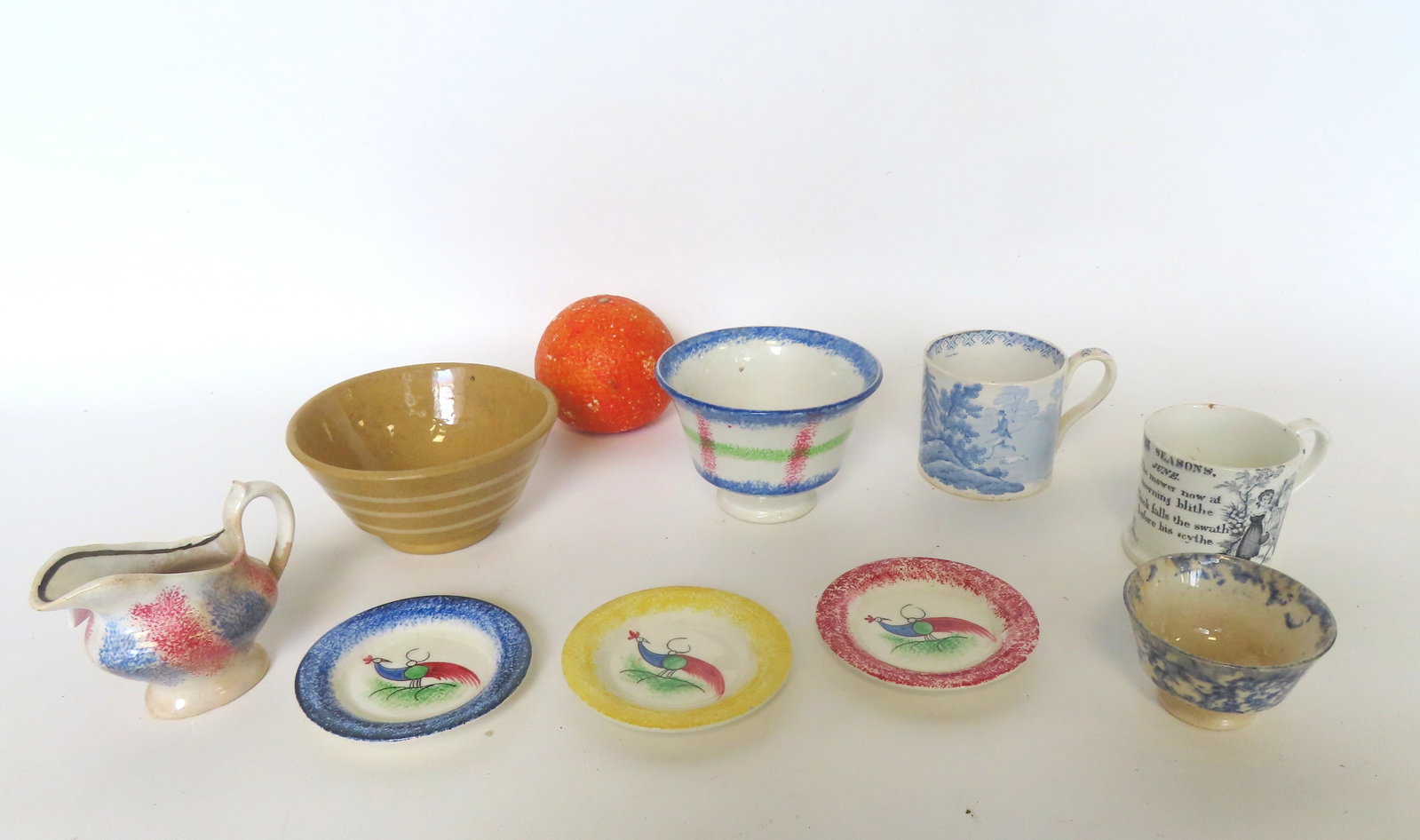 Nine pieces of miniature early hand painted porcelains including spatterware, yellowware, 2: Nine pieces of miniature early hand painted porcelains including spatterware, yellowware, 2 Staffordshire child's cup - one with verse, etc. The small spongeware cup with hairline, the spatterware cre