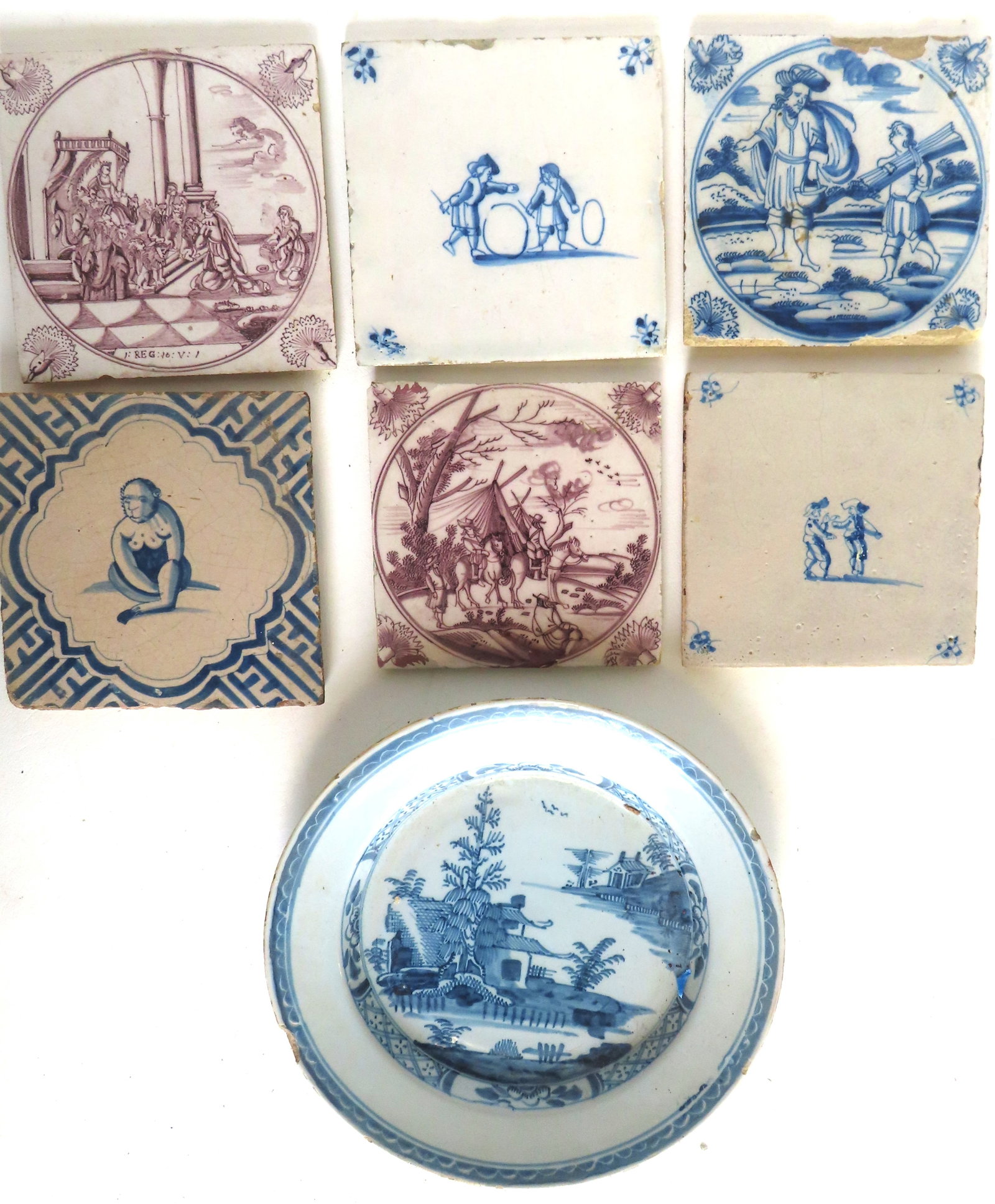 Grouping of 6 Delft tiles, 17th & 18th century together with an 18th century Delft blue and white: Grouping of 6 Delft tiles, 17th & 18th century together with an 18th century Delft blue and white plate, oriental motif. The plate 8 3/4" diameter and with several edge chips. Five of the tiles in goo