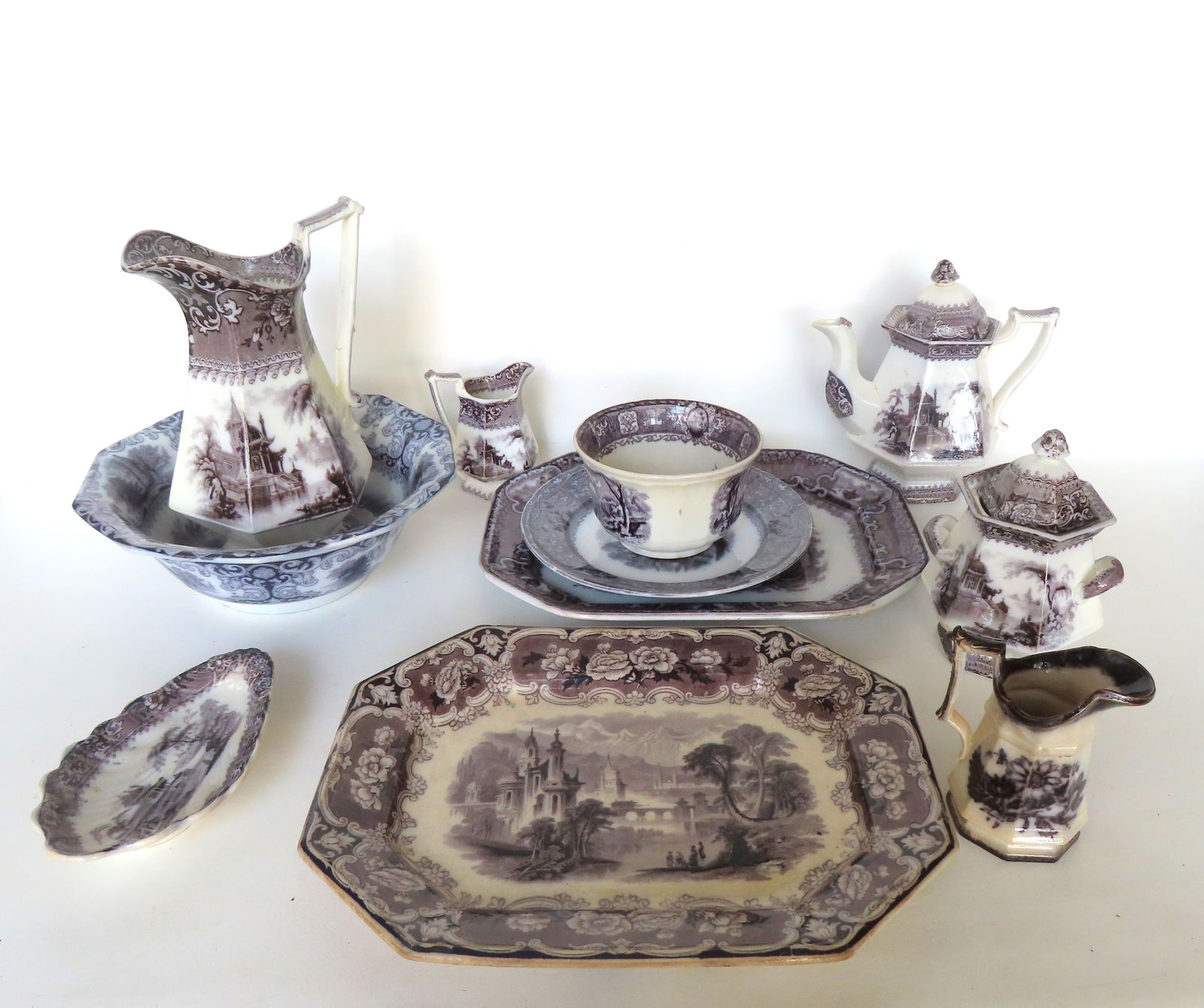 Grouping of 10 pieces of black and white Staffordshire china from the early 19th century, including:: Grouping of 10 pieces of black and white Staffordshire china from the early 19th century, including: A 3 piece tea service signed "Clementson / ironstone / Corea", Joseph Clementson active in Hanley E