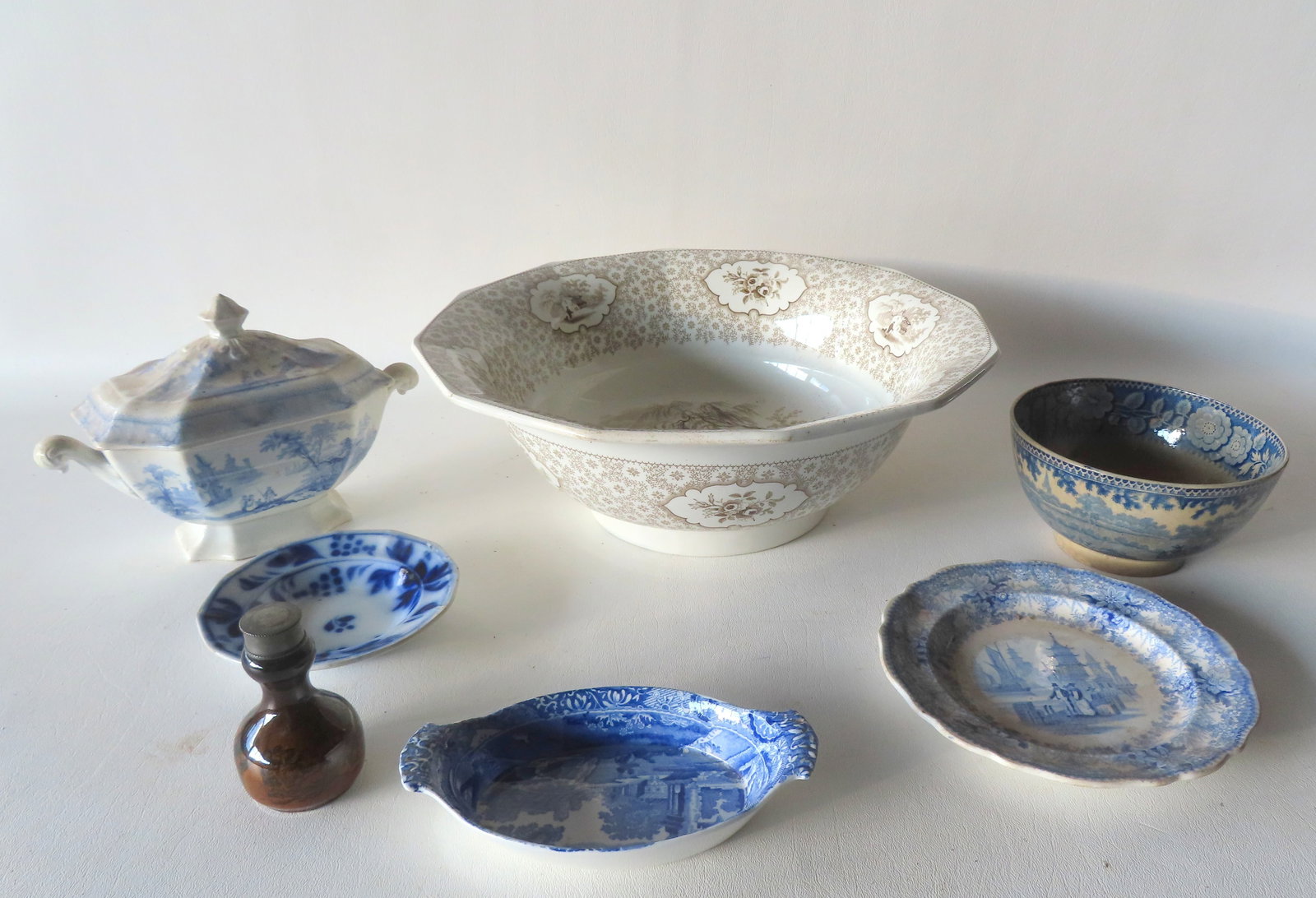 Grouping of mostly early Staffordshire china including: A Small blue and white covered tureen, no: Grouping of mostly early Staffordshire china including: A Small blue and white covered tureen, no damage - 8 3/4"W x 6"H; an Alcott, Tyrol pattern mulberry footed punch bowl - very good condition, no