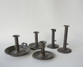 Grouping of 5 hog scraper candlestick, all early to mid 19th century - the tallest signed illegibly