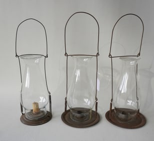 Three hanging wire and tin candle lanterns, early to mid 18th century. All in good condition with