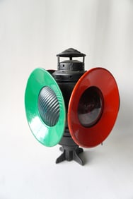 Signed Armspear NY railroad switch lantern with 4 lenses, 2 blue and 2 red. Repainted and missing