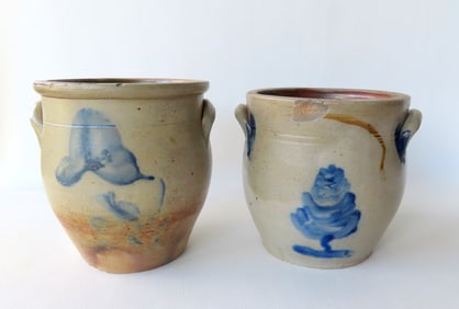 Two stoneware jars, slightly ovoid, probably 1 gallon size. One with single flower is the largest