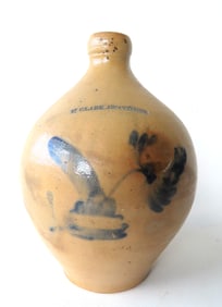 A stoneware ovoid jug, probably 1 gallon size, with the impressed mark of "N. CLARK JR. ATHENS", and