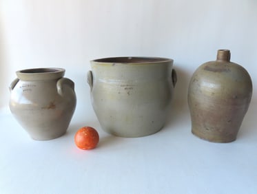 Three stoneware crockery items including: Unmarked jug with cobalt blue decorations on handle -