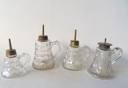 Four glass fluid lamps, 3 hand blown in the Star and Moon pattern, 19th century. All in very good