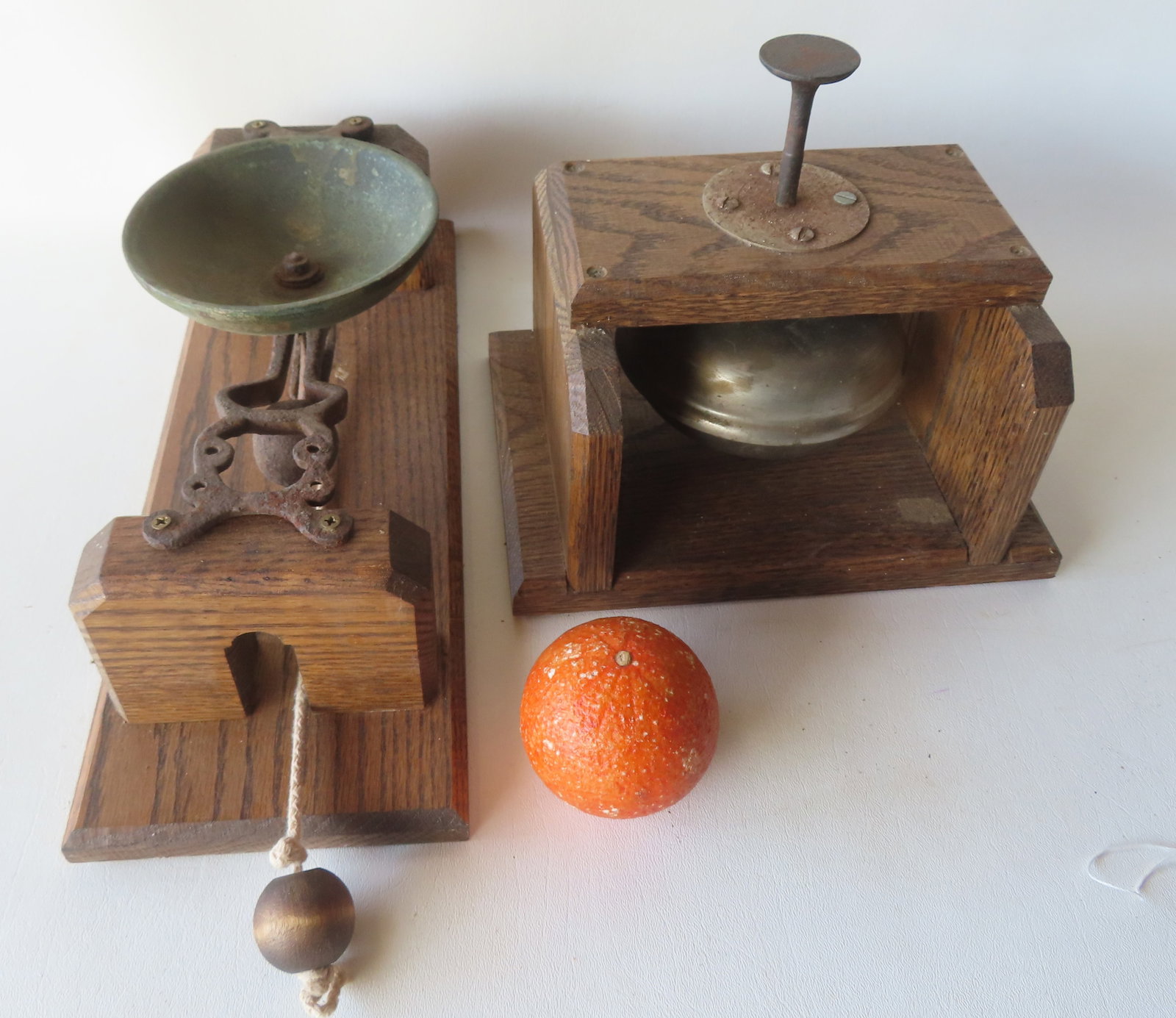 Two 19th century bells mounted on newer oak forms - both bells in very good condition in working: Two 19th century bells mounted on newer oak forms - both bells in very good condition in working order. One is a pull string country store bell measuring 16" x 6" x 5 1/4"H; the other, very rare, with