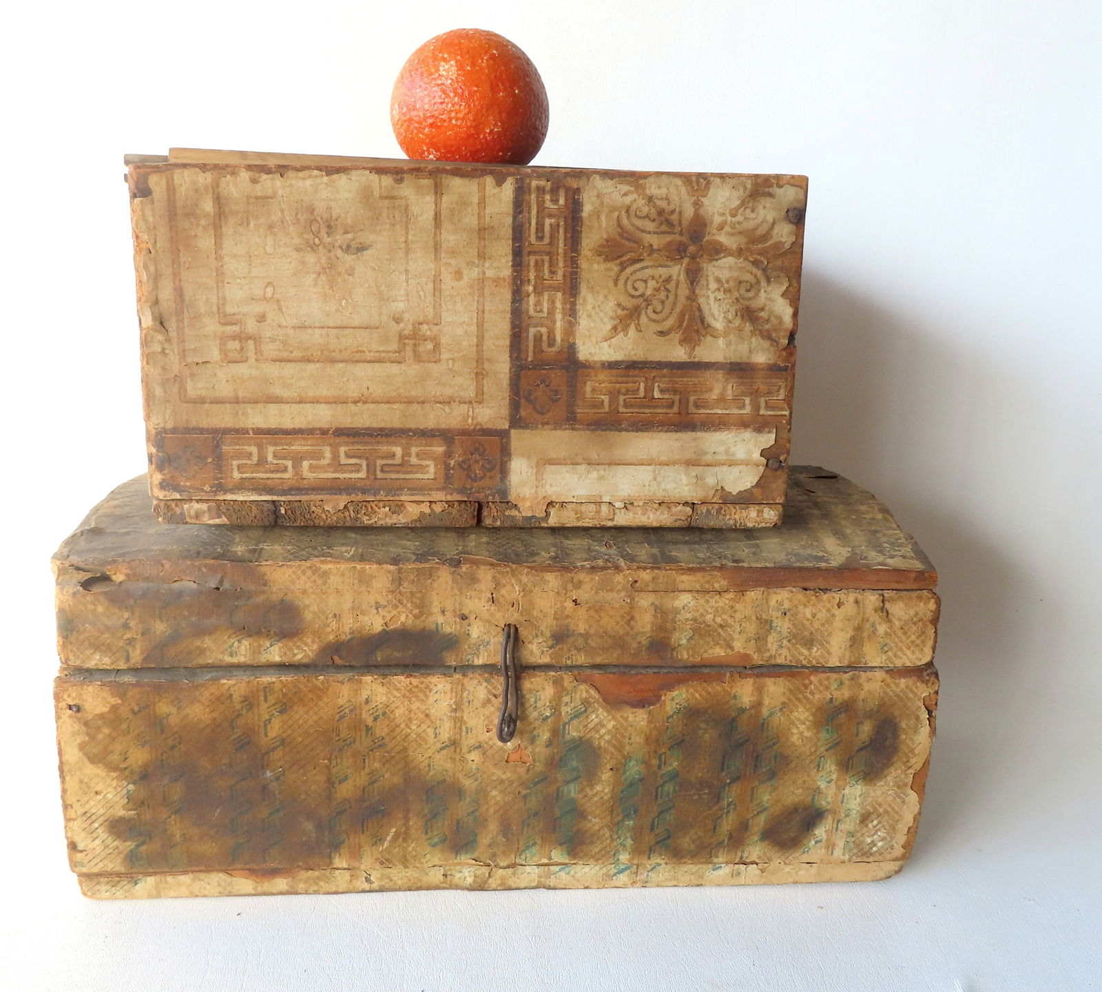 Two primitive wooden wallpapered boxes circa 1800. The first a slide lid soap box filled with old: Two primitive wooden wallpapered boxes circa 1800. The first a slide lid soap box filled with old hand made soap - the box with staining and discoloration but in good structural condition - measures 8