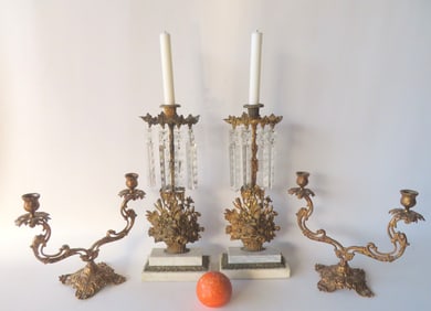 Two pair of 19th century brass candle holders.