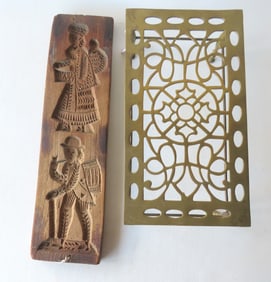 Two country collectables including a double sided gingerbread board decorated with figures of men