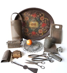 A large grouping of mostly kitchen collectibles in tin and iron, see photos for more details. All