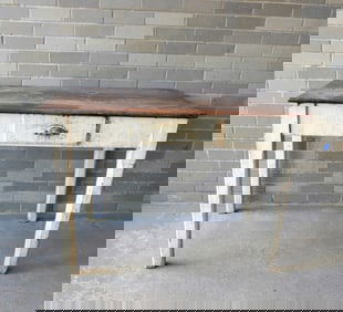A primitive country work table in oak, with chamfered tapered legs and center drawer, partial white