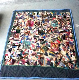 An exceptional 19th century crazy quilt, all hand sewn with fine embroidery work.