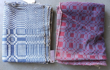 Two coverlets, both early 19th century and in geometric pattern. The first in blue and white, 2