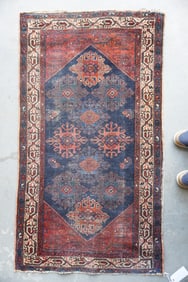 A good oriental scatter rug, late 19th century.