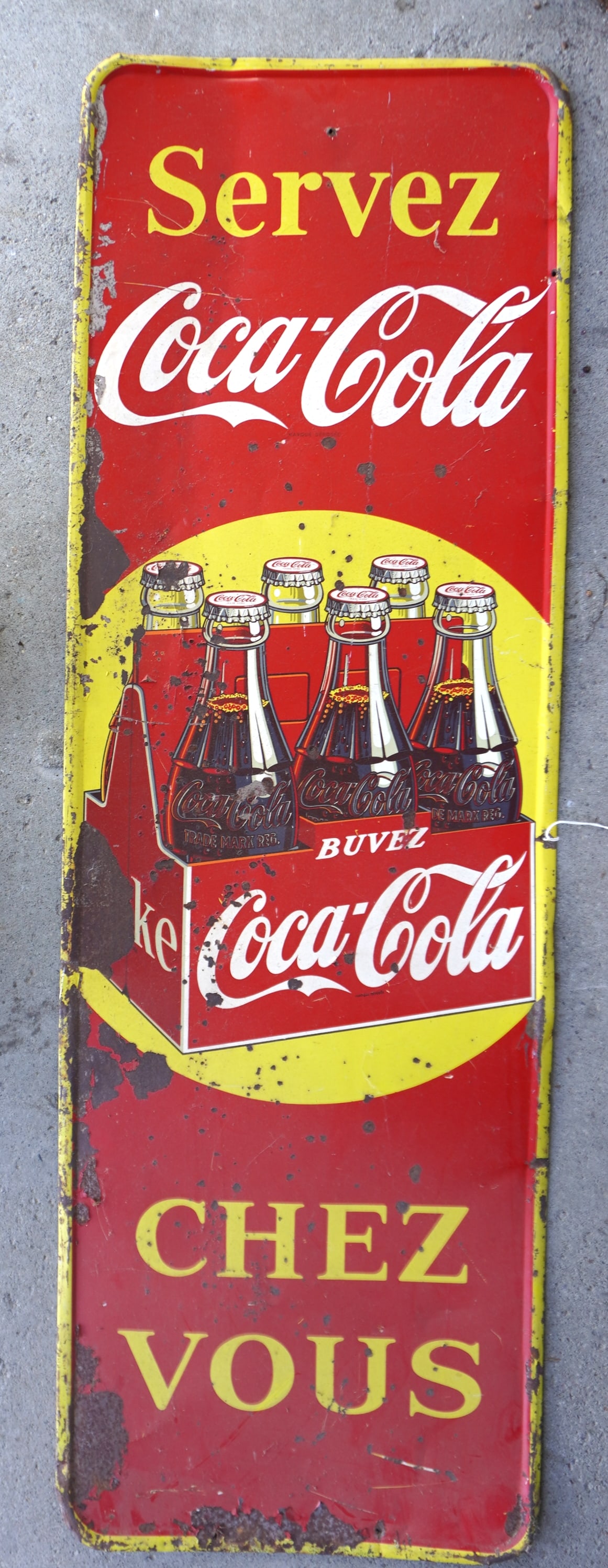 Colorful lithographed tin French Coca Cola wall hanging sign, circa 1930-40. Rusting, mostly around: Colorful lithographed tin French Coca Cola wall hanging sign, circa 1930-40. Rusting, mostly around border, some small dings, overall fair to good condition. Measures 53 1/4"L x 17 3/8"H. Provenance: 