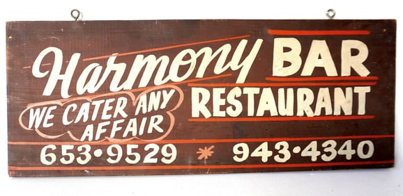 A wooden restaurant and bar sign, professionally hand painted, marked "Harmony Bar / Restaurant / We