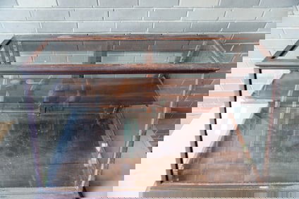 A country store table top slant front oak showcase with sliding rear doors and single shelf signed