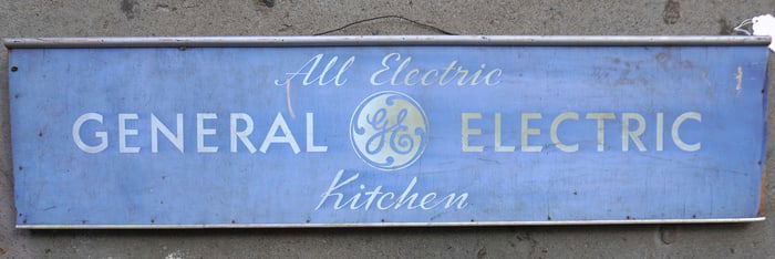 Wooden signed marked "All Electric GENERAL ELECTRIC Kitchen", white lettering on a blue ground -
