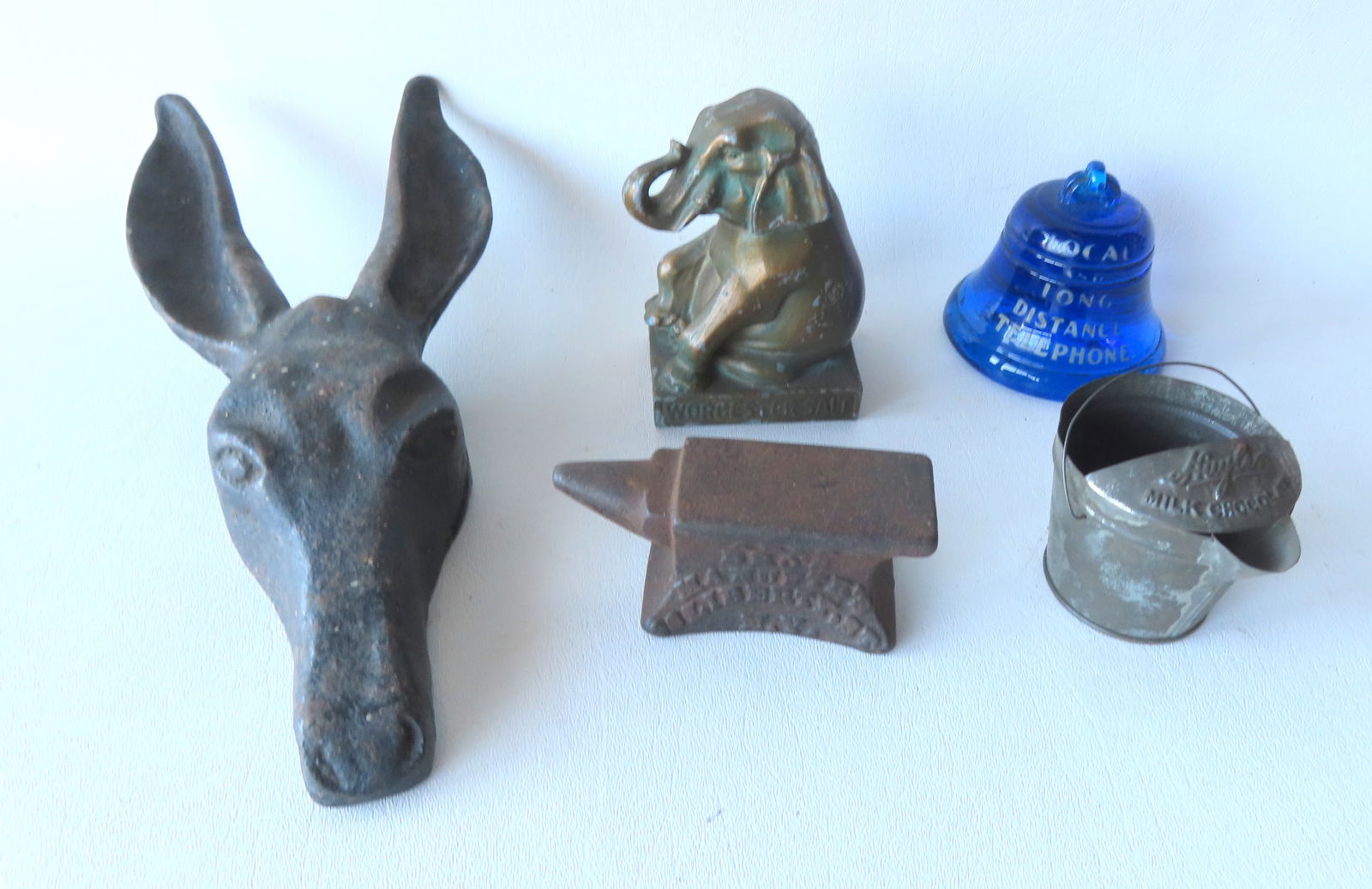 Grouping of 5 small advertising collectibles, includes: A Democrat cast iron donkey boot jack, given: Grouping of 5 small advertising collectibles, includes: A Democrat cast iron donkey boot jack, given as a souvenir for Theodore Roosevelt's 1932 campaign - very good condition - marked "Pat Pend." wit