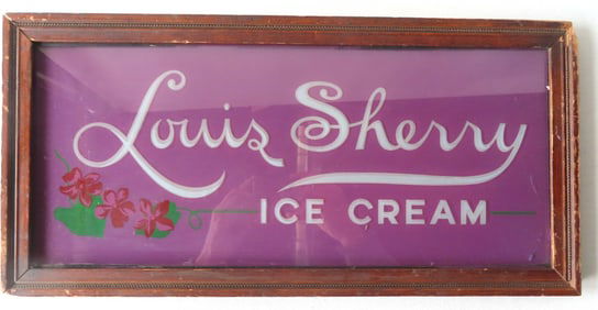 An framed etched glass "Louis Sherry Ice Cream" sign with painted flowers in corner, circa 1900-20.