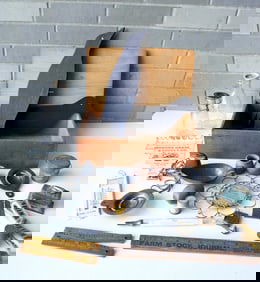 A grouping of mostly farm related advertising articles and 2 hand made wooden silhouette crow