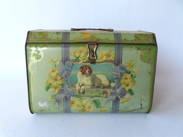 A Distinguised Member Of The Human Society lithograph biscuit tin decorated with dogs.