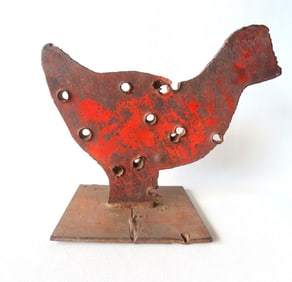 A folk art hand made silhouette chicken form sheet steel shooting target welded to iron base and