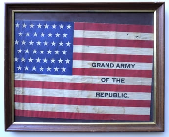 A 45 star banner-flag marked "GRAND ARMY OF THE REPUBLIC" across the white stripes, circa 1900. Some