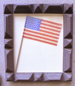 A very fine American trampart frame currently housing a 45 star American parade flag attached to