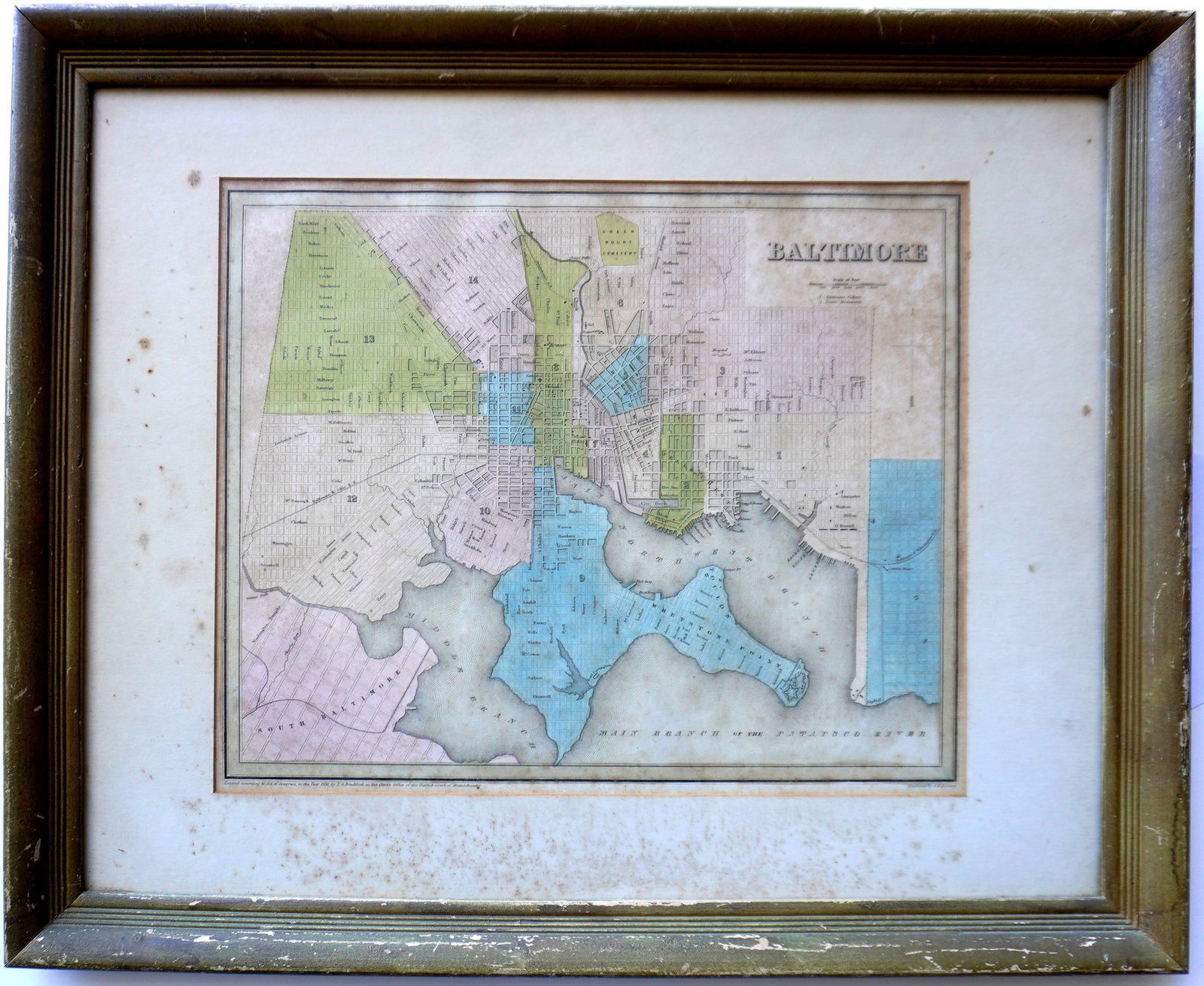 A hand colored map of Baltimore engraved by G.W. Boynton and published by T.G. Bradford in 1838.: A hand colored map of Baltimore engraved by G.W. Boynton and published by T.G. Bradford in 1838. Some foxing and housed in a newer frame with matting - overall good condition. Sight size 14 1/4" x 11 